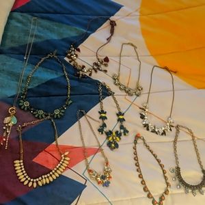 Variety of embellished, ornamented necklaces